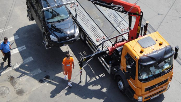 Masina ridicata platforma parcare neregulamentara taxa recuperare 2026