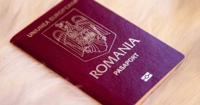 Un cetățean român prezentând documentele de ședere la un ghișeu consular pentru eliberarea unui pașaport CRDS în 2026